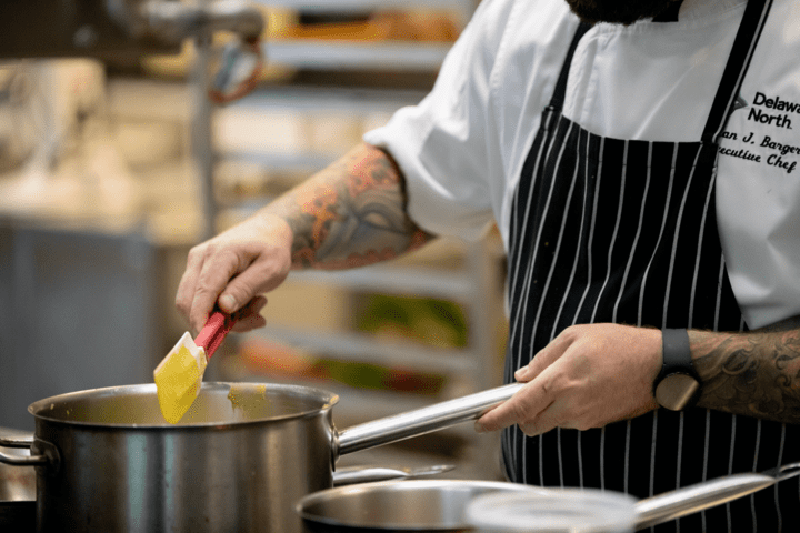 Chef making sauce