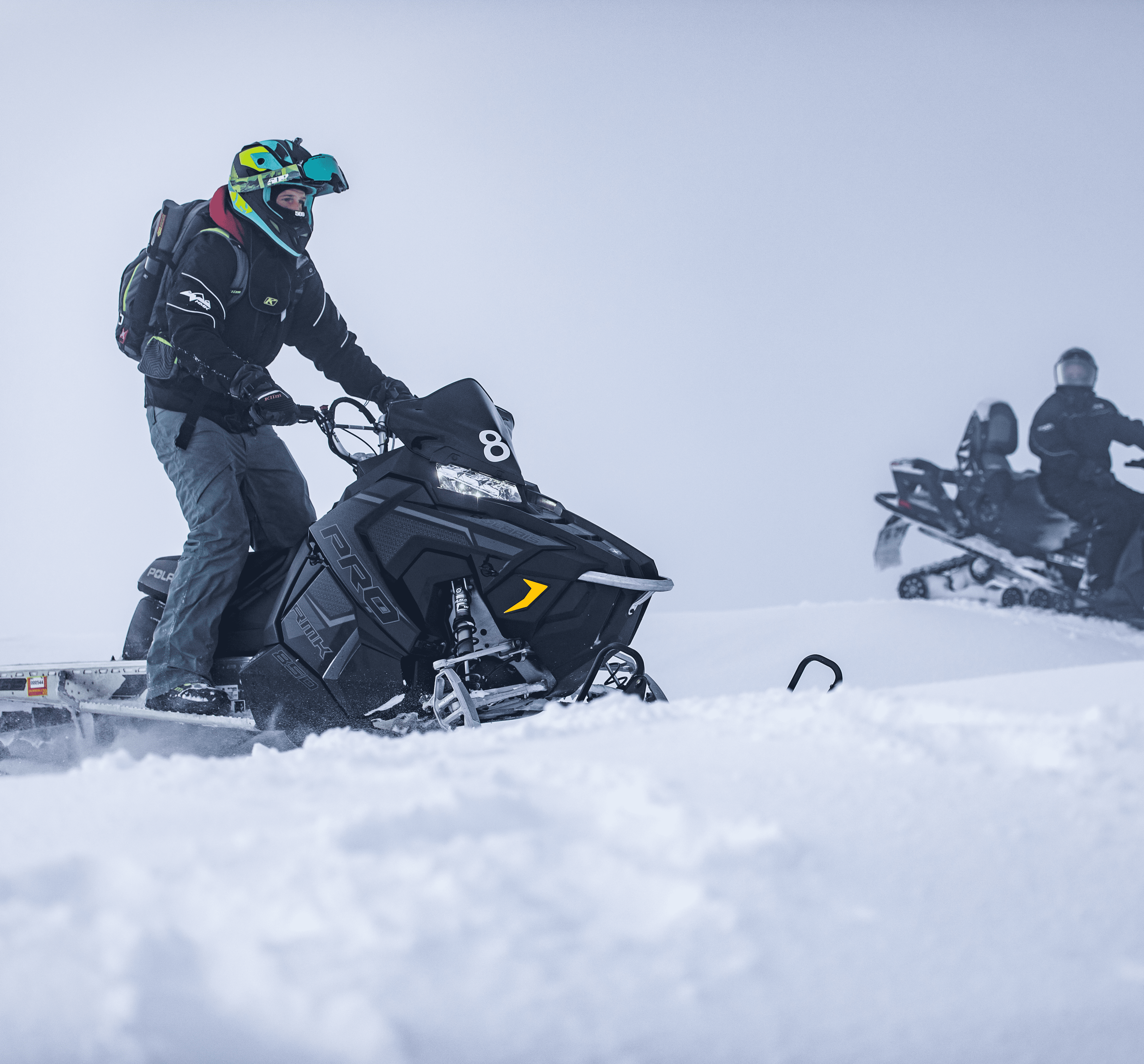 A person on snowmobile in Yellowstone National Park