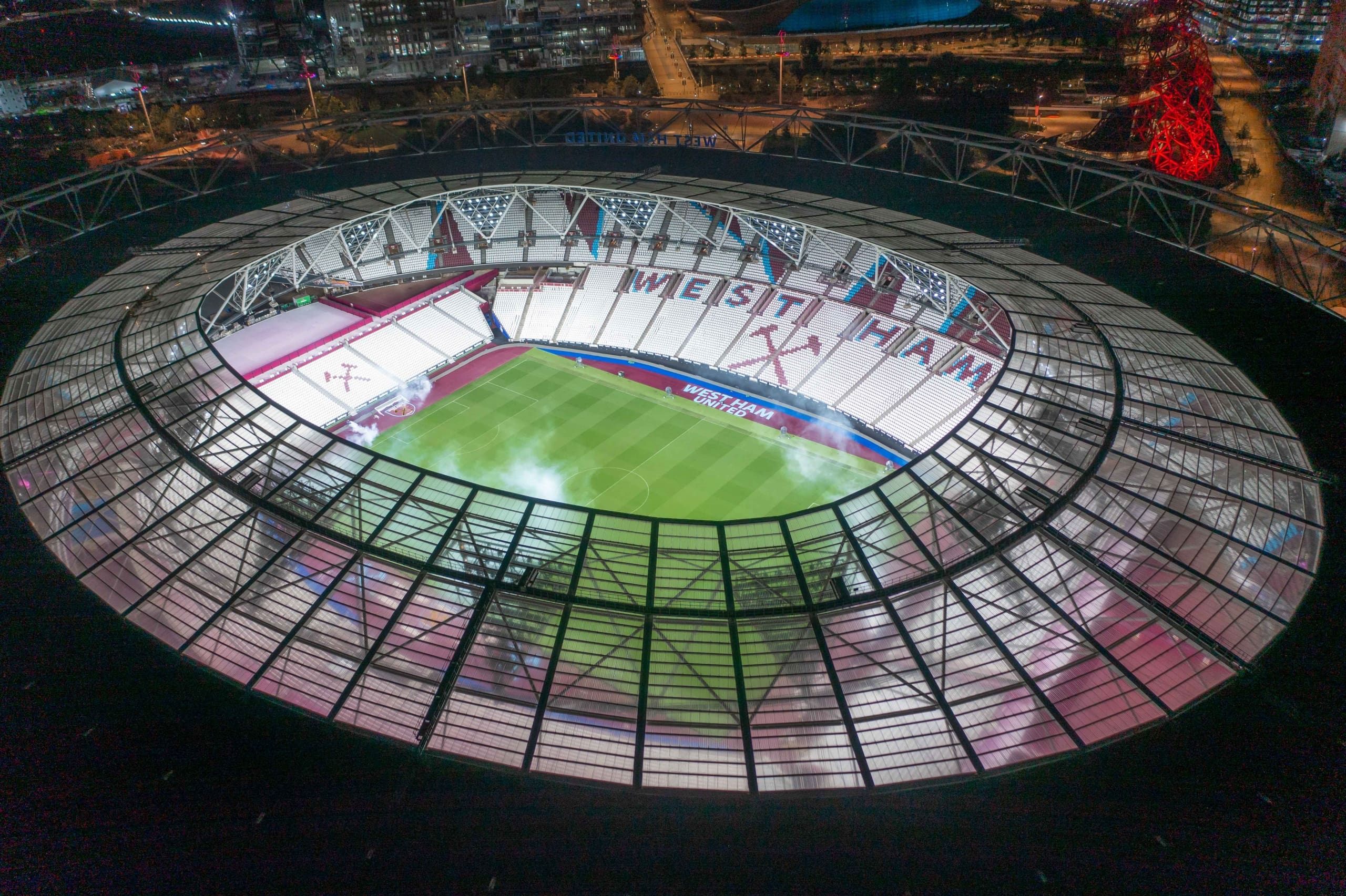 Exterior shot of London Stadium at nighttime