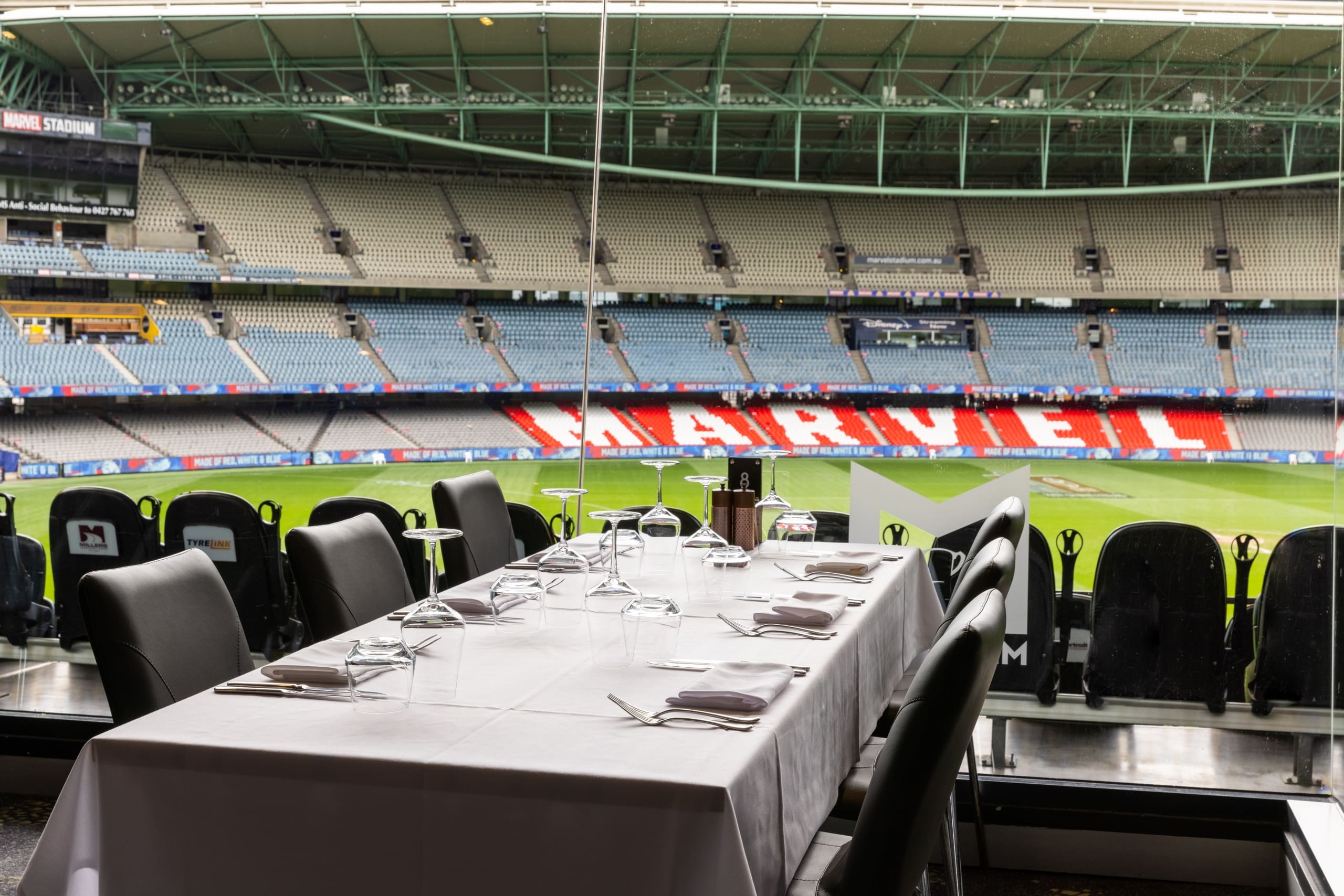 Pitch side view of Marvel Stadium from the box