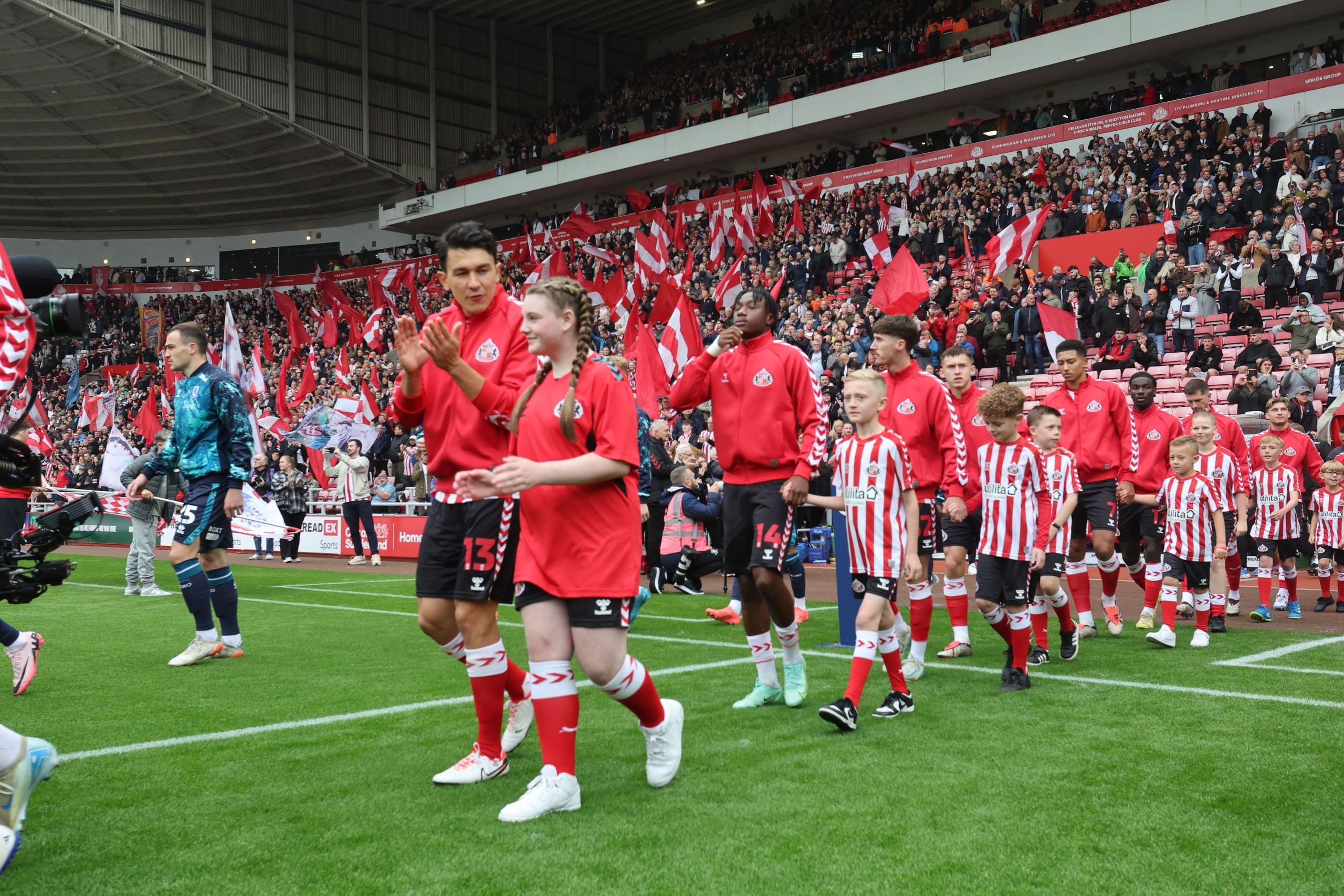Sunderland AFC players walking out onto the pitch before match kick off