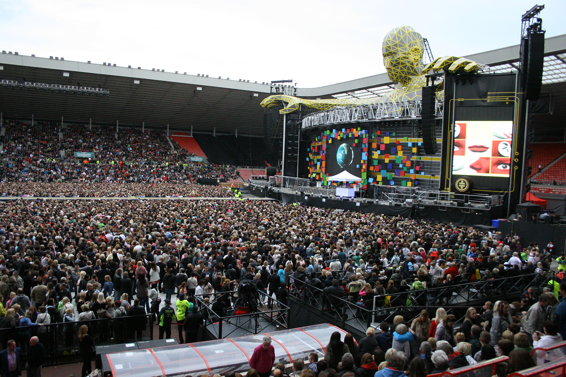 Take That performing in front of crowd at Stadium of Light
